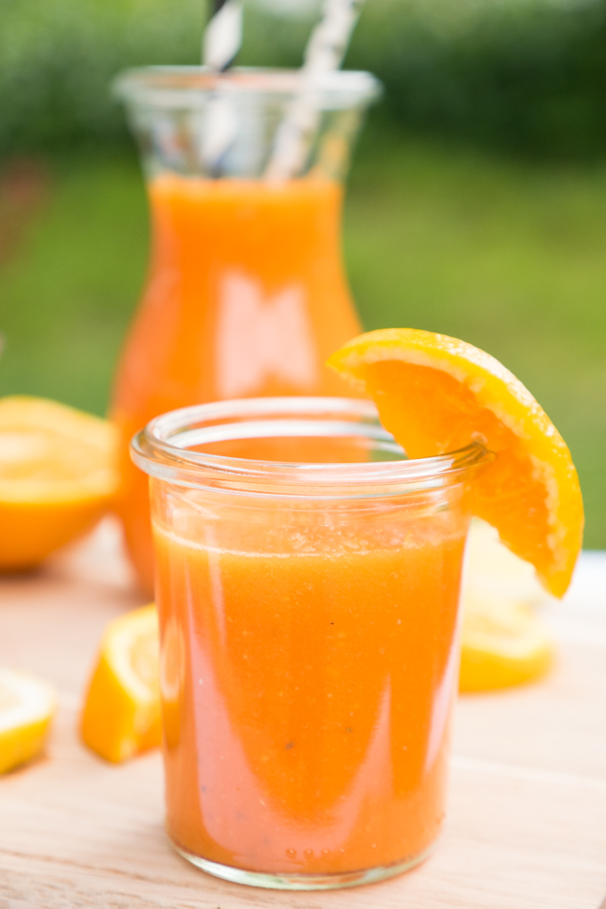  Smoothie with oranges, carrots, papaya, lemon, ginger and chia seeds 